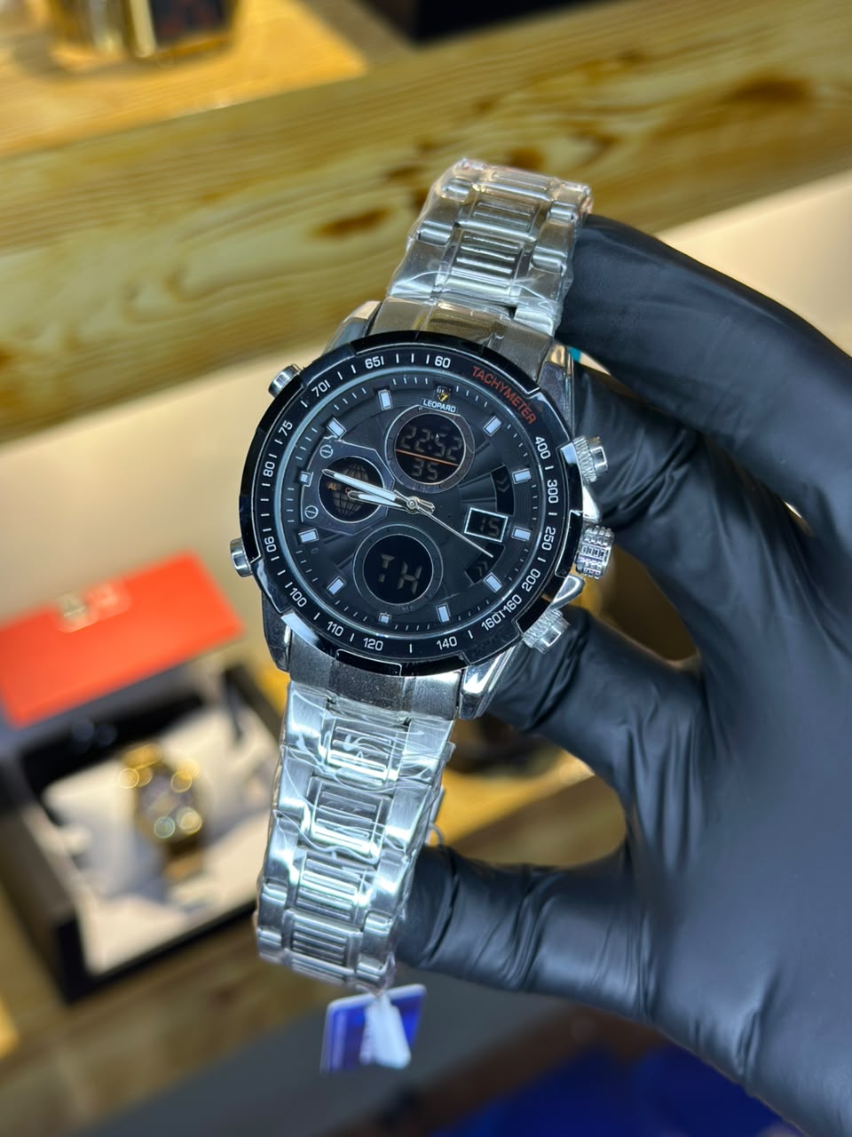 LEOPARD chronograph watch, black dial, silver bracelet